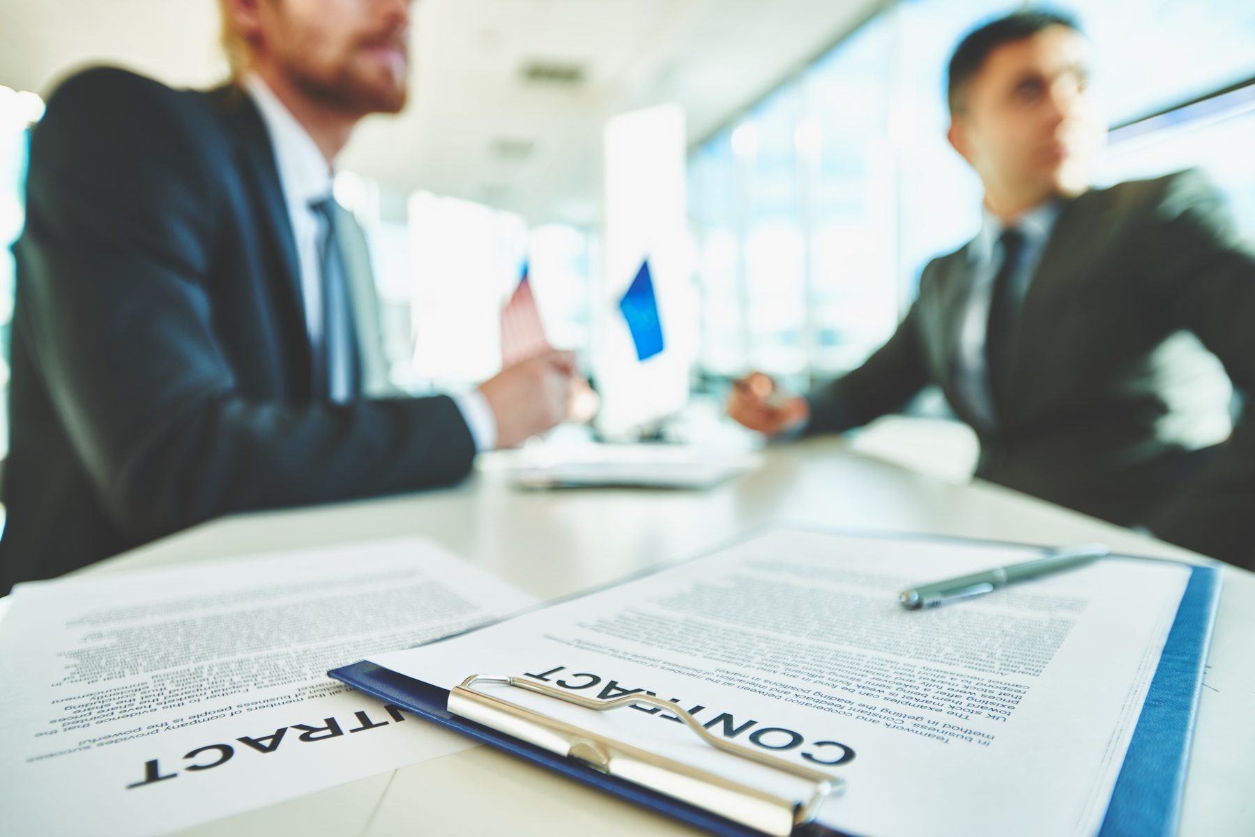 Reviewing a contract at a desk